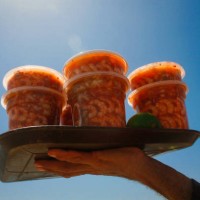 Vendor offers a seafood cocktail locally called Seven Powers amidst the Coronavirus pandemic in La Guaira, Venezuela on September 18, 2021.