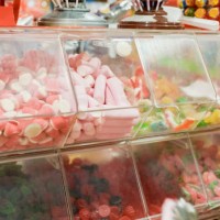 view of a candy stand at the store's counter. - junk food stock pictures, royalty-free photos & images