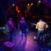 view of band performing to audience from back of stage - concert stock pictures, royalty-free photos & images