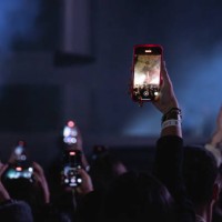 View of the crowd with cell phones taking pictures during Rels B concert at Palau Sant Jordi on March 07, 2025 in Barcelona, Spain.