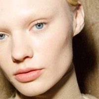 Vilma Sjöberg, make up detail, poses backstage at the Max Mara fashion show during the Milan Fashion Week Womenswear Fall/Winter 2023/2024 on...