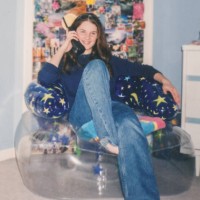 vintage 1990s 2000s teen talking on phone, vintage teen sitting on inflatable chair - fashion stock pictures, royalty-free photos & images