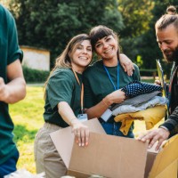 volunteers are preparing donation boxes at the food and clothes bank - food stock pictures, royalty-free photos & images