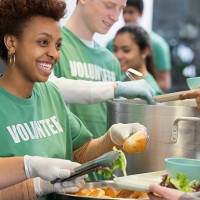 volunteers working in soup kitchen - food stock pictures, royalty-free photos & images