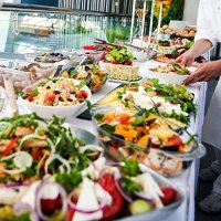 waiter serving a buffet table - food stock pictures, royalty-free photos & images
