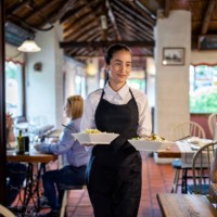 waitress serving food at restaurant - food stock pictures, royalty-free photos & images