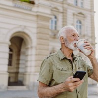 walking on the street - junk food stock pictures, royalty-free photos & images