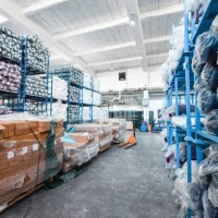 warehouse in textile factory stuffed with many materials - fashion stock pictures, royalty-free photos & images