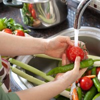 washing vegetables - food stock pictures, royalty-free photos & images