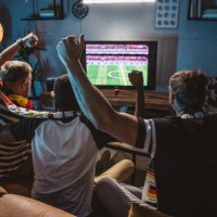 watching soccer championship at home - home decoration stock pictures, royalty-free photos & images