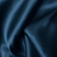 wavy folds of grunge blue silk texture satin velvet material or luxurious blue silk as background, folds of blue silky fabric. - fashion stock-fotos und bilder
