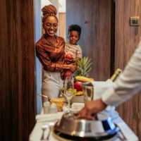 wealthy hotel guest receiving room service. - food stock pictures, royalty-free photos & images