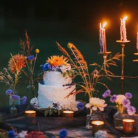 wedding cake on table with candles outdoors - garden decoration stock pictures, royalty-free photos & images