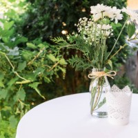 wedding reception decor, tables with white linens, vintage glassware, baby's-breath, lace and twine. - garden decoration stock pictures, royalty-free photos & images