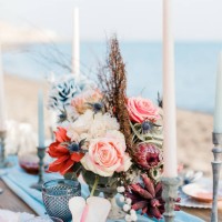 wedding table setting on a beach in santorini with coral wedding flowers - home decoration stock pictures, royalty-free photos & images