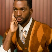 well-dressed african man looking pensive - fashion stock pictures, royalty-free photos & images