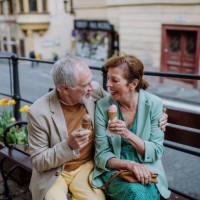 well dressed senior couple dating together in city centre, old town. - travel stock pictures, royalty-free photos & images