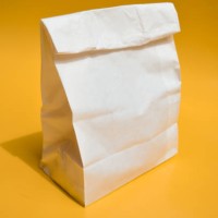 white paper bag lunch bag - junk food stock pictures, royalty-free photos & images