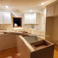 white shaker cabinets installed in kitchen under renovation - home decoration stock pictures, royalty-free photos & images