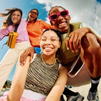 wide angle shot of gen z group of friends hanging out together. - fashion stock pictures, royalty-free photos & images