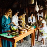 wide shot of group of friends taking traditional mayan cooking class while on vacation - food stock pictures, royalty-free photos & images