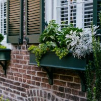 window boxes adorn house exterior - garden decoration stock pictures, royalty-free photos & images