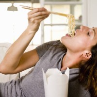 woman at home - junk food stock pictures, royalty-free photos & images