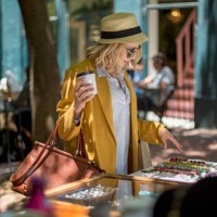 woman at outdoor market stall, cape town, south africa - fashion stock-fotos und bilder