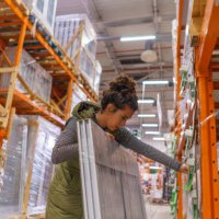 woman buying materials to renovate her house - home decoration stock pictures, royalty-free photos & images