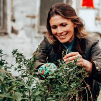 woman doing gardening outdoors - garden decoration stock pictures, royalty-free photos & images