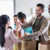 woman donates bag of fruit to food bank - food stock pictures, royalty-free photos & images