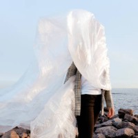 woman dressed in plastic for the sea - fashion stock pictures, royalty-free photos & images