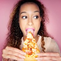 woman eating pizza slice - junk food stock pictures, royalty-free photos & images