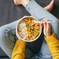 woman eating rice with tofu for lunch - food stock pictures, royalty-free photos & images