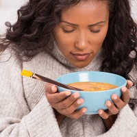 woman enjoying soup. - food stock pictures, royalty-free photos & images