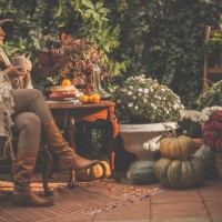woman enjoying sunny day in back yard - garden decoration stock pictures, royalty-free photos & images