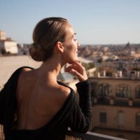 woman enjoying the view from roman rooftop terrace - hairstyle stock pictures, royalty-free photos & images