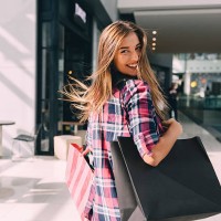 woman enjoying the weekend in the shopping mall - fashion stock pictures, royalty-free photos & images