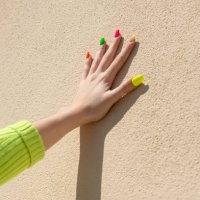 woman fingers with multicolor nail art manicure - nails art stock pictures, royalty-free photos & images