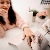 woman getting nails done - nails art stock pictures, royalty-free photos & images