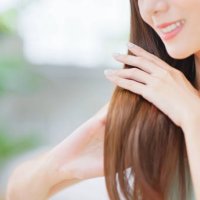 woman has hair care - hairstyle stock pictures, royalty-free photos & images