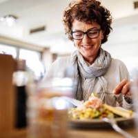 woman having lunch at a restaurant - food stock pictures, royalty-free photos & images