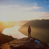 woman hiking in mountains on the background of lysefjorden - travel stock pictures, royalty-free photos & images