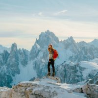 woman hiking in snow-covered dolomites in winter - travel stock pictures, royalty-free photos & images