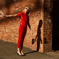 woman in a red suit in dumbo brooklyn - fashion stock pictures, royalty-free photos & images