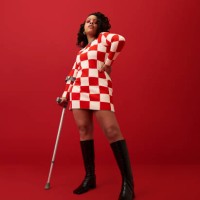 woman in boots standing with hand on hip - fashion stock pictures, royalty-free photos & images