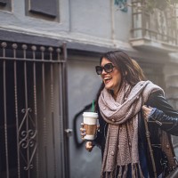 woman in city walk with coffee - junk food stock pictures, royalty-free photos & images