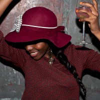 woman in hat drinking at party - fashion stock pictures, royalty-free photos & images