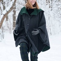 woman in heavy cape walking in snow - fashion stock pictures, royalty-free photos & images