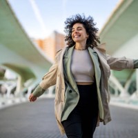 woman jumping high after successful job interview - fashion stock pictures, royalty-free photos & images